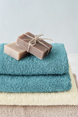 Fototapeta na wymiar Towels with soap bars