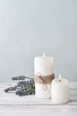 Fototapeta na wymiar Candles with lavender flowers