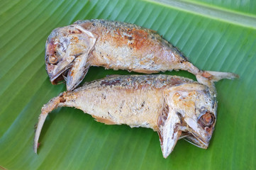 food of fried Rastrelliger on banana leaf