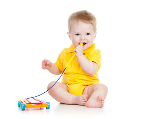 baby playing  with musical toy