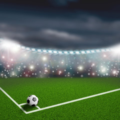 soccer ball on the green field corner
