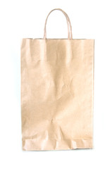 Blank brown paper bag isolated on white background