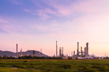 Fototapeta na wymiar oil refinery with beautiful sunset background