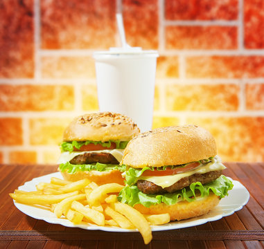fastfood burgers, soda and fries