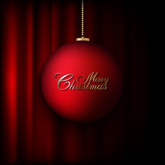 Christmas bauble on red background