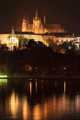 Fototapeta na wymiar Night Prague gothic Castle above River Vltava, Czech Republic