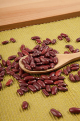 Red kidney beans with wooden spoon
