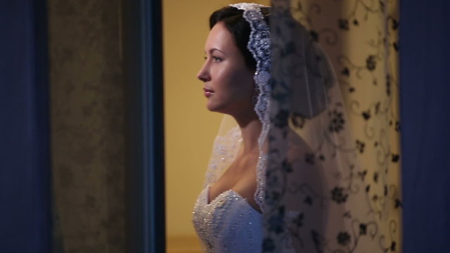 Beautiful bride in the window. Sequence