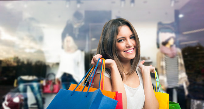 Smiling woman doing shopping
