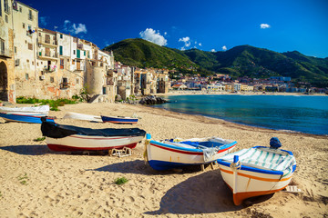 Old beach in Cefalu with fishing boats - obrazy, fototapety, plakaty