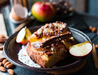 Christmas pie with spiced apples hold in hands