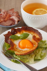 Homemade pancake cups with egg and mushrooms