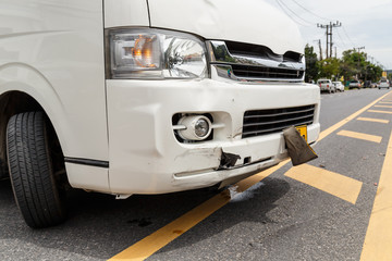 Body of white van get damaged by accident