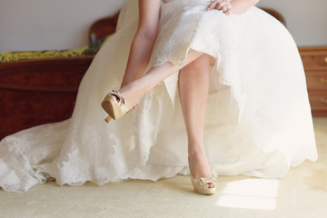 Fototapeta na wymiar Bride in Wedding Shoes