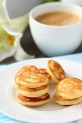 Freshly baked poffertjes - traditional Dutch little pancakes