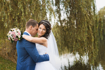 Bride and groom. City Quay. River