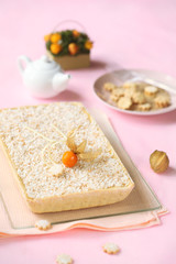 Pear and Coconut Tart decorated with Physalis