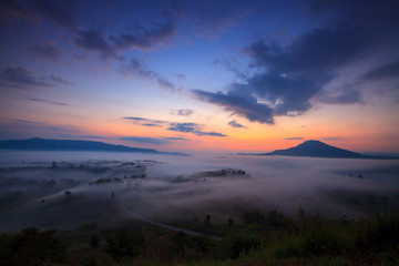 misty morning sunrise and road in mountain at Khao-kho Phetchabu