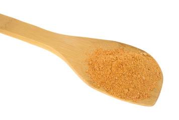 Portion of taco seasoning on a wood spoon