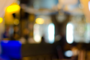Blurred interior of a location for food and drinks