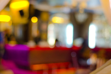 Blurred interior of a location for food and drinks