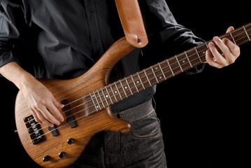 Obraz na płótnie Canvas playing bass guitar