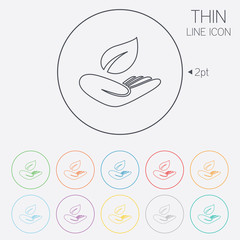 Nature insurance sign. Hand holds leaf symbol