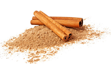 Cinnamon sticks and powder on a white background