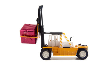 Forklift carrying gift box