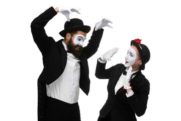 Two memes as businessmen fighting