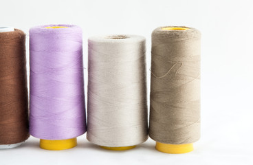 Spool of thread isolated on white background