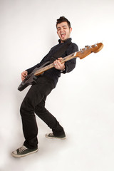 Focused bass player in black