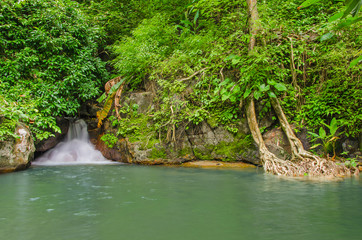Waterfall in deep rain forest jungle. Krok E Dok Waterfall Sarab