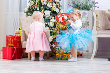 baby girl with christmas present