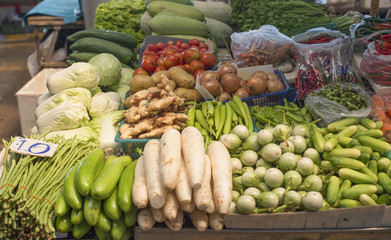 Various fresh vegetables in market.