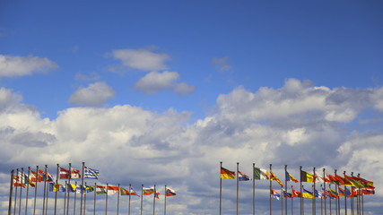 international flags against the sky - 74028449