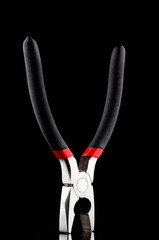 pliers red and black color to work