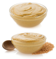 mustard sauce in bowl on white