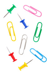 pushpin and paper clip on white