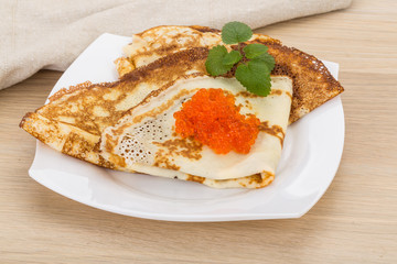Pancakes with red caviar