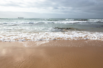 dramatic Atlantic coast at low tide.