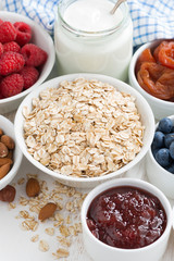 oat flakes, various ingredients for breakfast, vertical