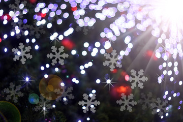 Defocused abstract light bokeh and flare christmas background