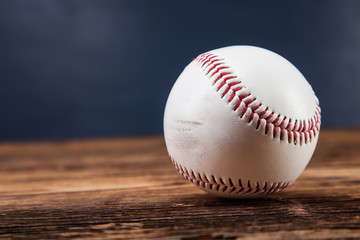 Baseball ball on wooden table