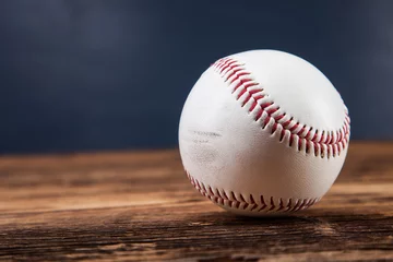 Fototapete Ballsport Baseball ball on wooden table
