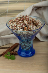 Peanut in honey with sesame seeds
