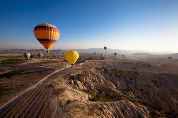inspiring beautiful landscape with hot air balloons