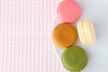 Tasty colorful macaroon on a plate