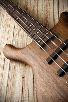 bass guitar on aged wood