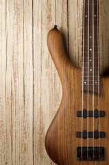bass guitar on wood